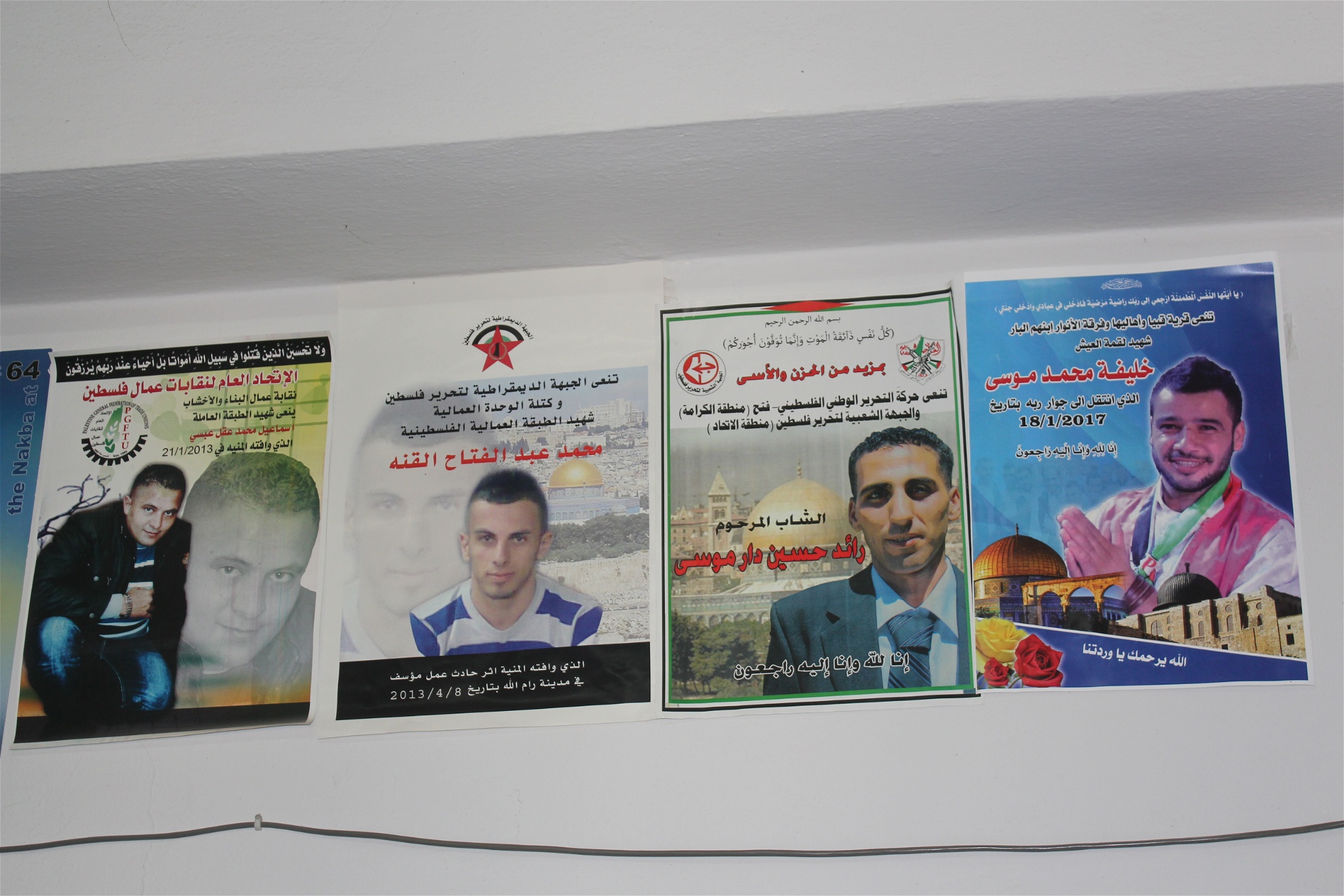 Bilder på PGFTU:s högkvarter i Ramallah av pale­­­stin­ska arbetare som dött i arbetsplatsolyckor i Israel.