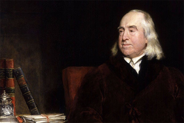 Jeremy Bentham menade att om arbetsgivaren lät de arbetsskygga smaka på arbetslöshetens barkbröd skulle arbetskraftstillströmningen sköta sig själv. Porträtt av Bentham av Henry William Pickersgill.