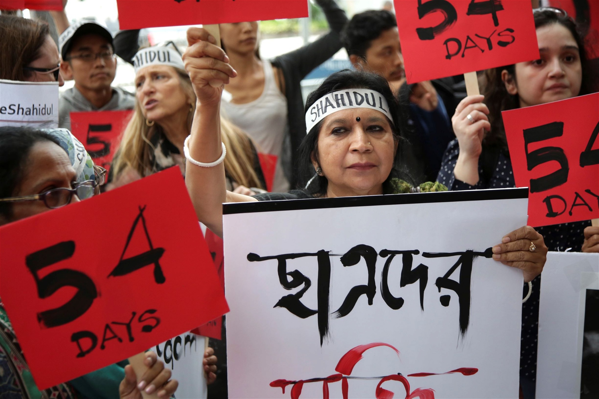 Protest utanför FN i New York, den 27 september, till stöd för fotojournalisten Shahidul Alam.